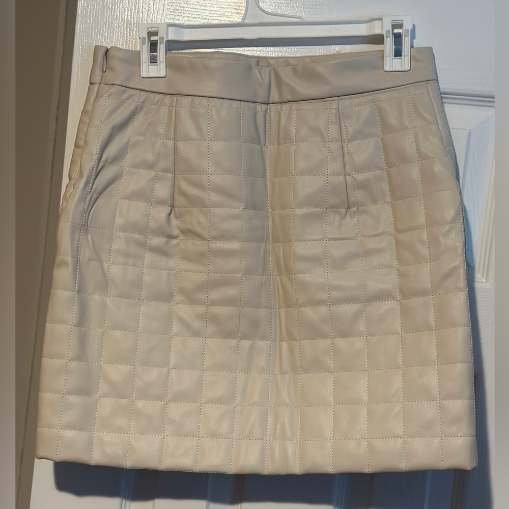 NEW - Quilted vegan leather mini skirt. Cream colored.